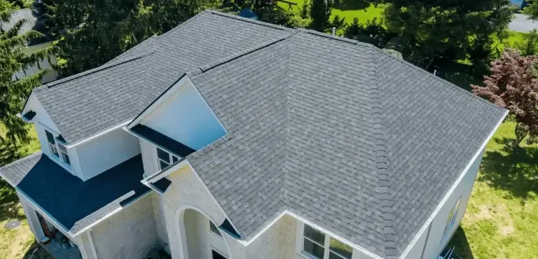 aerial view asphalt shingles roofing construction house with new window optimized - Platinum Roofing & Construction | Rockledge, FL Roofing Company